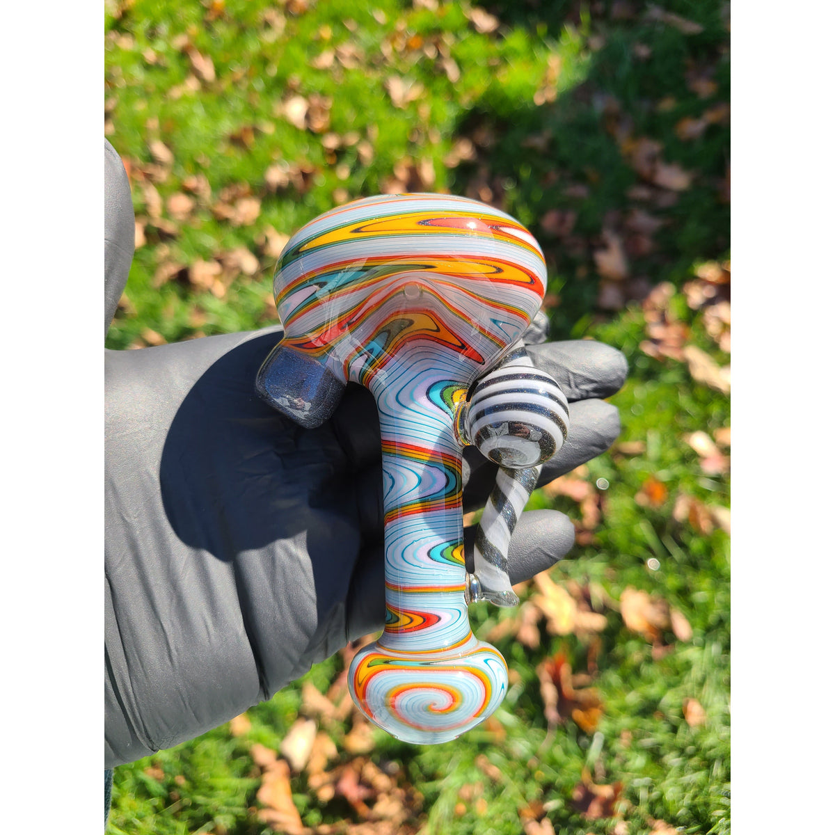 Mattybglass wig wag spoon with marble.