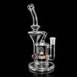 OJ Flame Bell Recycler in Mai Tai, clear glass with amber and purple marble accents, 14mm female joint, on black background