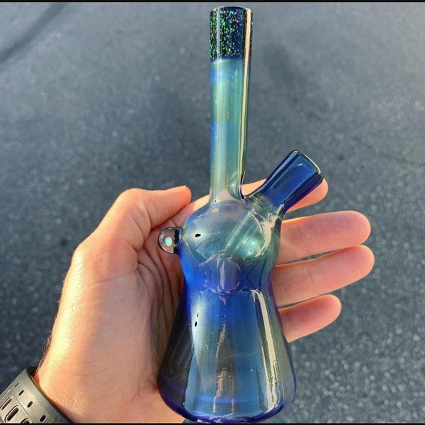 AJ Surf City Tubes mini tubes in Sonic Over Green Money, Sunstone, and Orange.