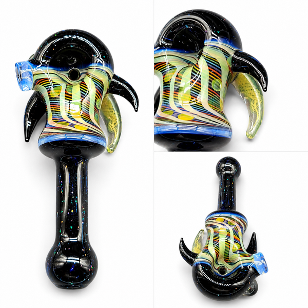 BigZGlass applying sculptural color and detail to a hand pipe form.