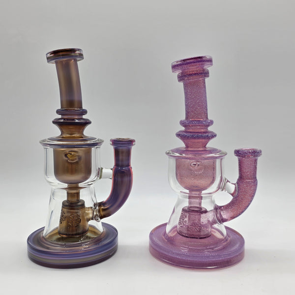 KJ Custom torus rigs in dichro and purple.